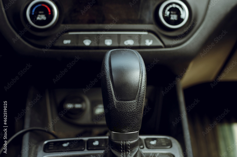 gear shift knob of a used car. Close-up, selective focus.