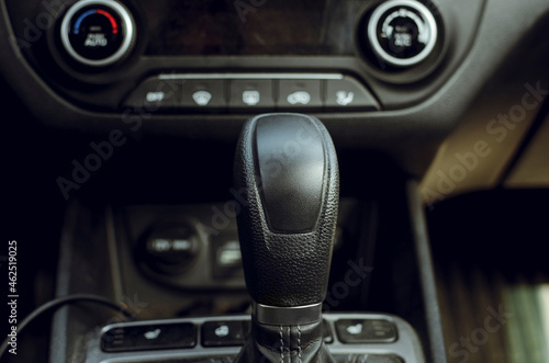 gear shift knob of a used car. Close-up, selective focus.