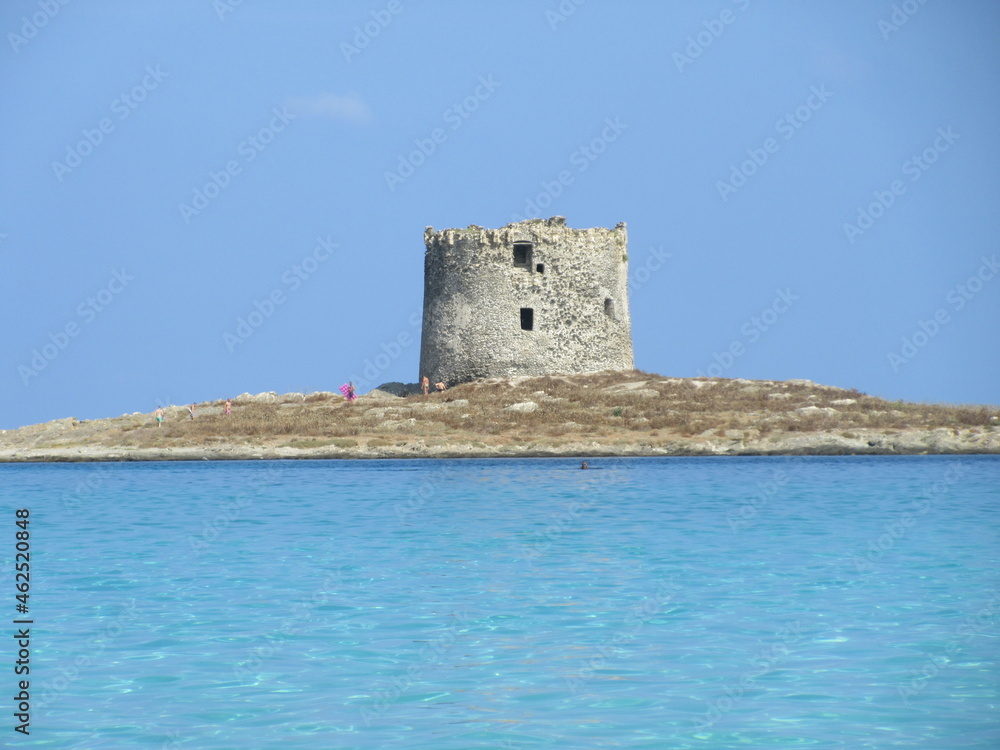 medieval watchtower and defensive tower on an island in Sardinia torre la Pelosa Italy