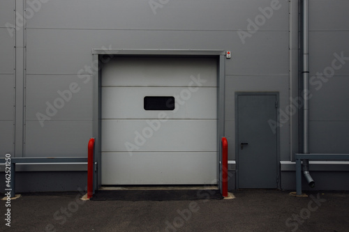 Closed door of transport terminal for truck deliveries and loading