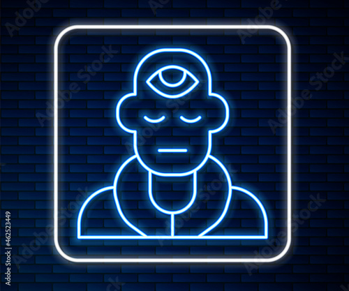 Glowing neon line Wizard warlock icon isolated on brick wall background. Vector
