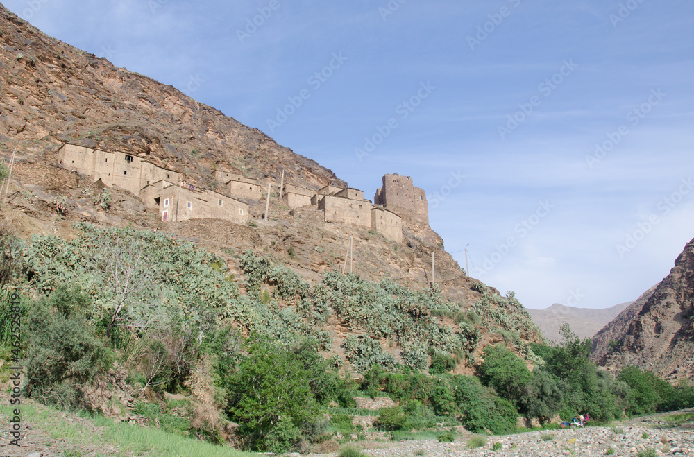 castle and village, in high atlas mountains morocco. the use of this kind of castle in the high mountains is to protect the goods of the villagers,