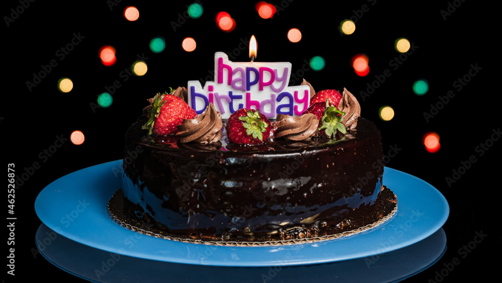 Obraz na płótnie Urodzinowy czekoladowy tort w salonie