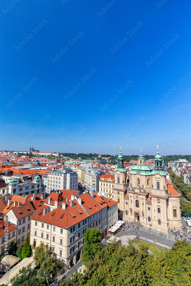 Landscape view of the old town square and the Saint Nicholas Church from the Astronomical Clock in Prague.
