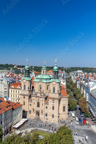 Landscape view of the old town square and the Saint Nicholas Church from the Astronomical Clock in Prague.