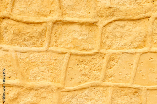 Gold or yellow paint on wall photo