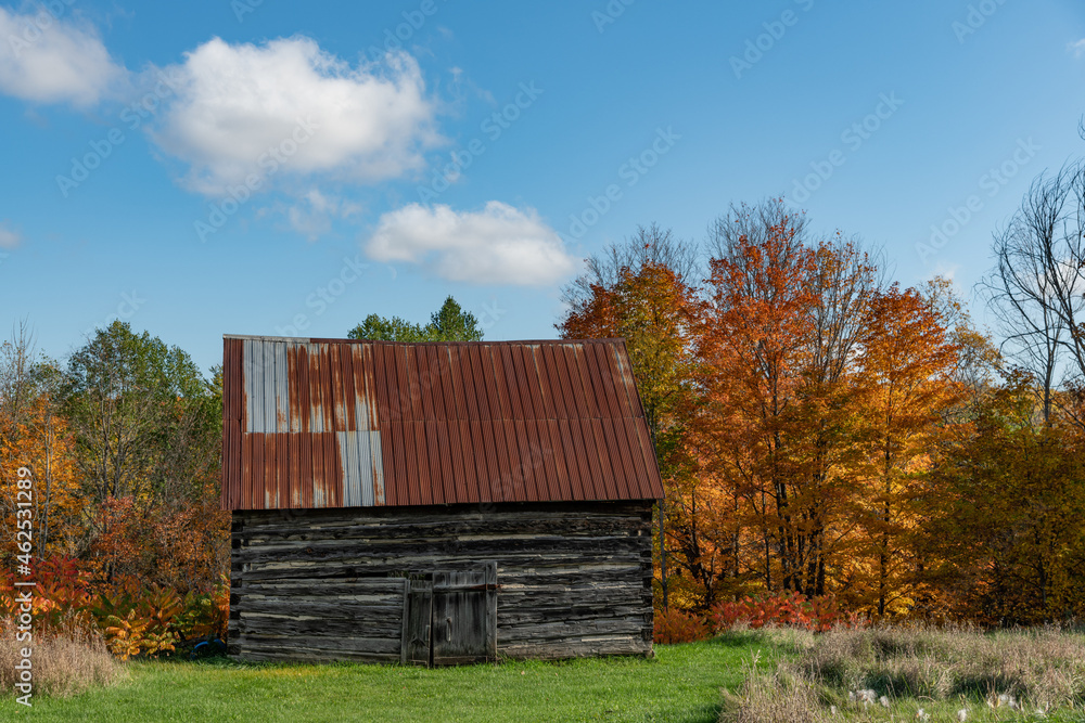 Old Barn in Autumn with Beautiful Puffy Clouds Old Barn in Autumn with Beautiful Puffy Clouds