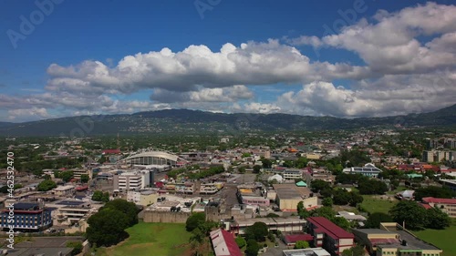 Aerial view of Kingston city, living houses, government buildings and mountains.