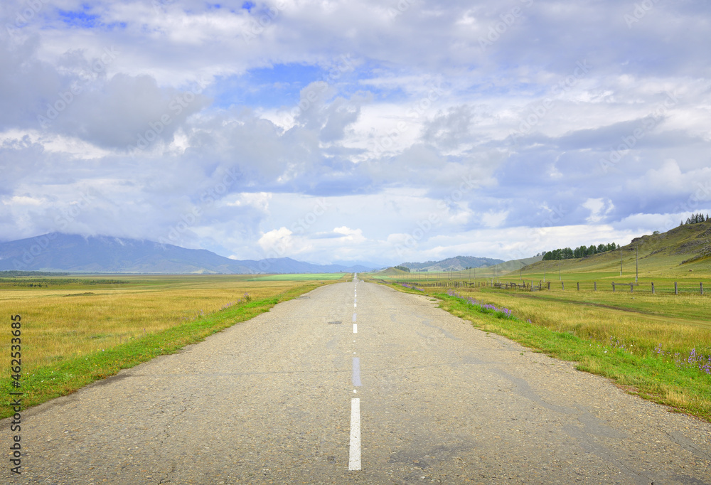A deserted road in the Altai mountains A deserted road in the Altai mountains