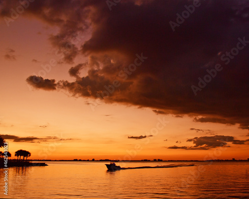 Boat at the sunset beautiful seascape © yuliyagallimore
