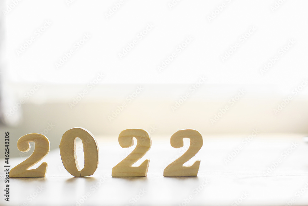 2022 wood number with blurred background for new year concept 2022 wood number with blurred background for new year concept