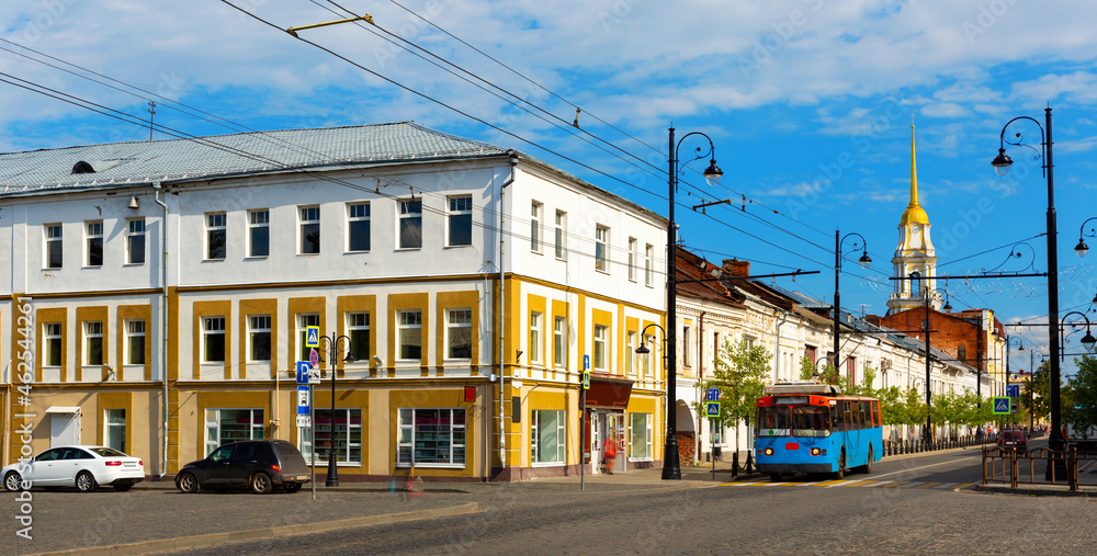Krestovaya street in Rybinsk with view of shops and residential buildings.