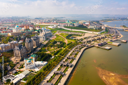 Aerial view of historical districts of Kazan on bank of Volga River overlooking ancient Kremlin on sunny summer day, Republic of Tatarstan, Russia.