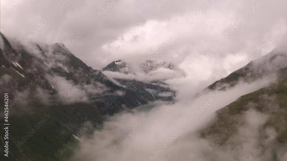 Aerial view of mountain top with fog and snow on Italian Alps, Italy. Aerial view of mountain top with fog and snow on Italian Alps, Italy.