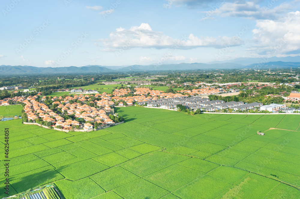 Land or landscape of green field in aerial view. Include agriculture farm, house building, village. That real estate or property. Plot of land for owned, sale, rent, buy, purchase and investment.