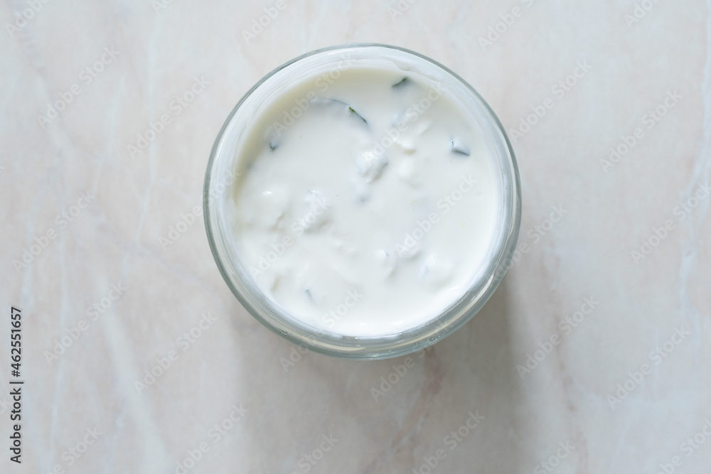 Take Away Tzatziki - Traditional Greek Yogurt Sauce in Glass Bowl. Take Away Tzatziki - Traditional Greek Yogurt Sauce in Glass Bowl.