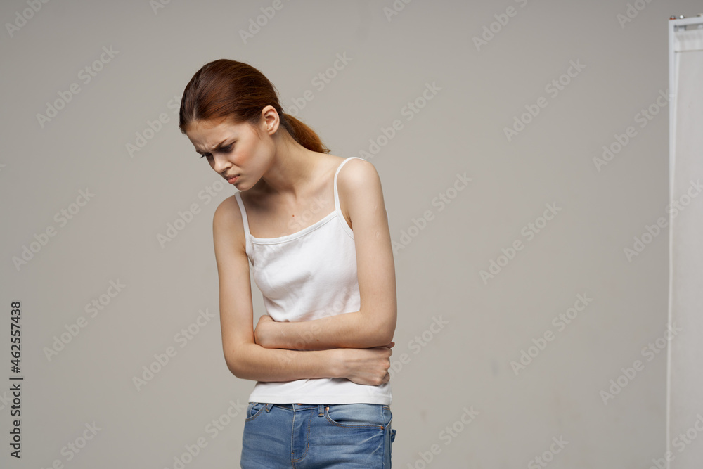 sick woman groin pain intimate illness gynecology discomfort light background sick woman groin pain intimate illness gynecology discomfort light background