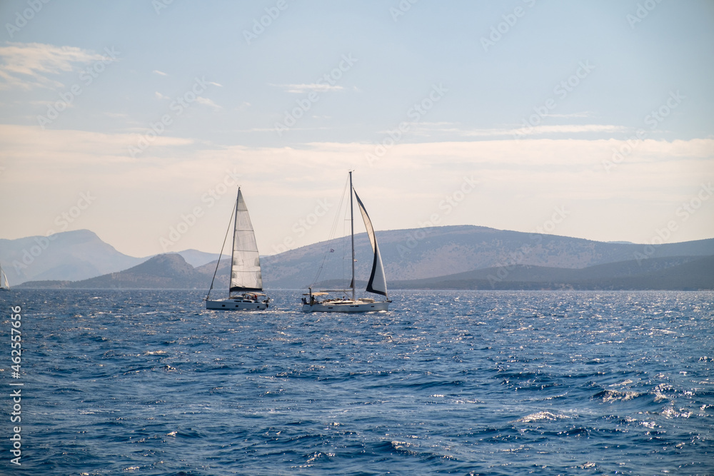 Fototapeta premium Catamaran sail Yacht cruising on deep blue sea water