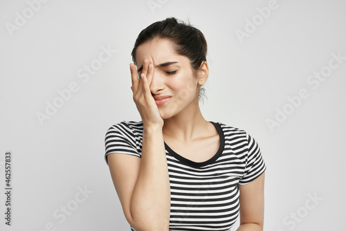 sick woman holding his head migraine depression isolated background