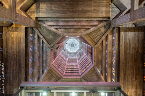 Le Havre, Normandie, France - 08 23 2021: Interior of the Saint-Joseph church, a futuristic cathedral, conceived as a memorial to the fallen during the war, in the town of Le Havre, Normandy, France photo