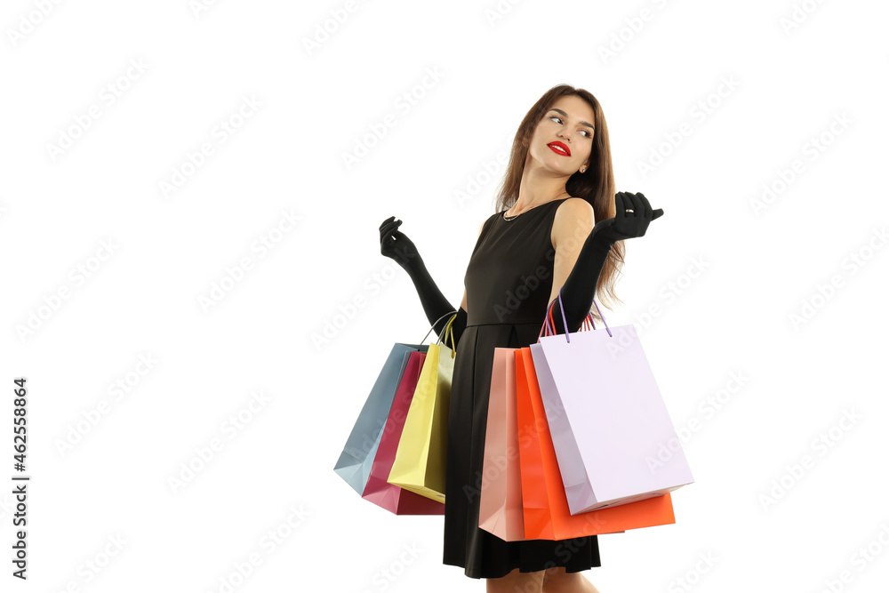 Girl with multicolored paper bags isolated on white background