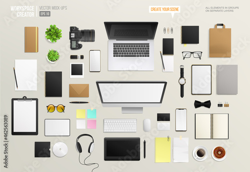 Top view work place desktop template with laptop and blank mockups stationery items collection. Editable Mock-up set of creative workspace background. Desktop equipment for a design or photo studio photo