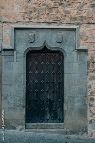 medieval door of historic building, spain