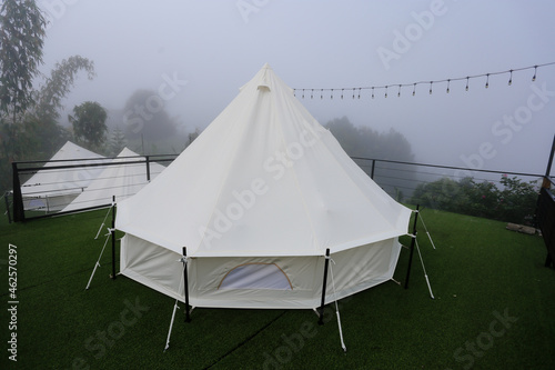 White tents for tourists. Relax and enjoy the atmosphere thick fog on Khao Kho  Thailand.