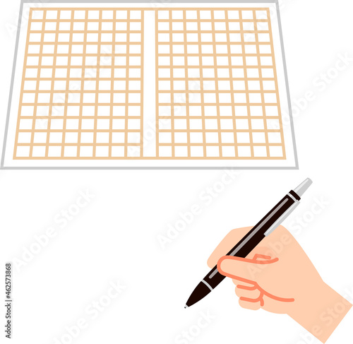 原稿用紙とペンを持つ手