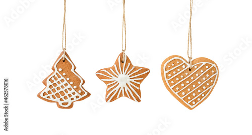 Hanging Christmas gingerbread cookies isolated on a white background
