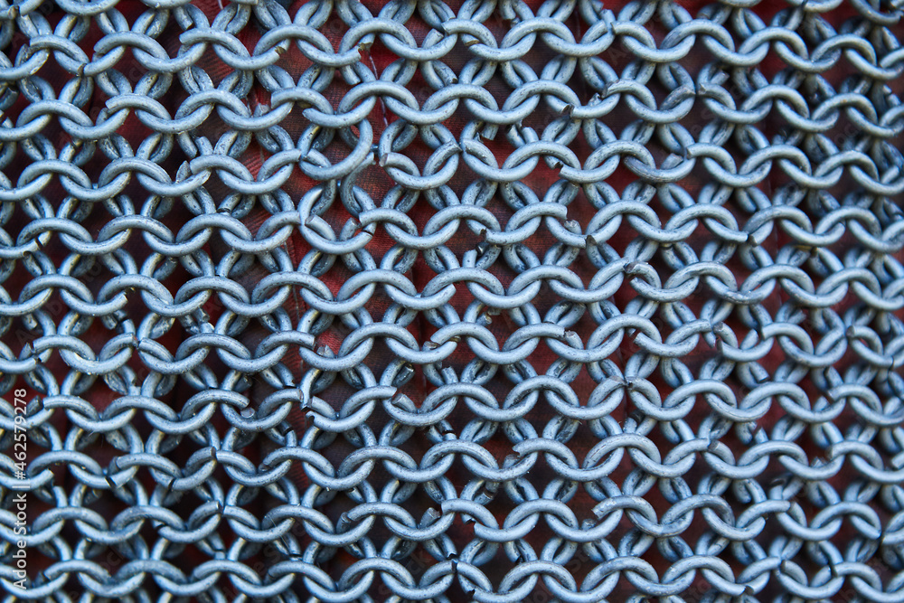 An element of chain mail made of steel plates and wire. Protection and defense of the knight An element of chain mail made of steel plates and wire. Protection and defense of the knight