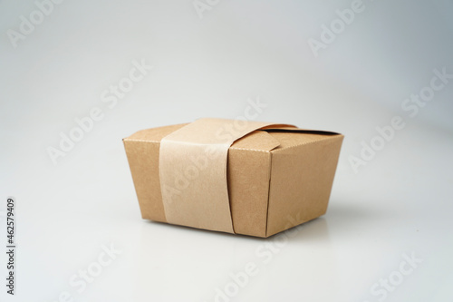Fotografija Take away box disposable food container craft paper mock up and cover on grey background with copy space