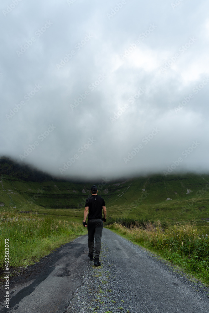 a man walking on Gleniff Horseshoe, Co. Sligo, Ireland