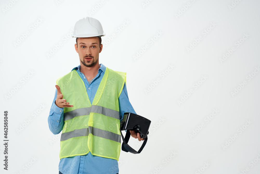 engineer in a white helmet construction VR glasses isolated background engineer in a white helmet construction VR glasses isolated background