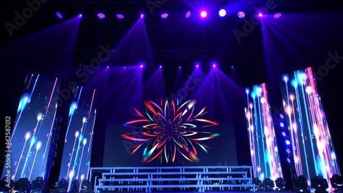 Animation of stage lights frame. Bright shiny stage lights flashing movement entertainment spotlight projectors in the dark, blue soft light spotlight strike on black background.