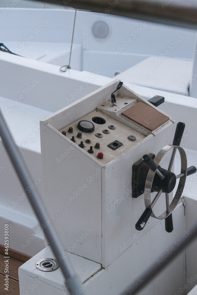 Steering position with steering wheel of small boat Steering position with steering wheel of small boat
