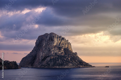 Scenic Es Vedra island in Spain at sunset photo