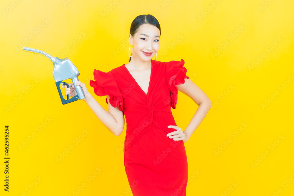 Portrait beautiful young asian woman feul gas pump Portrait beautiful young asian woman feul gas pump