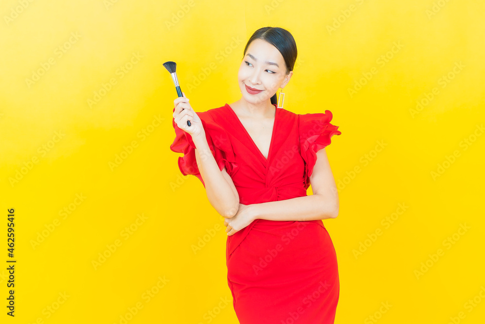 Portrait beautiful young asian woman with make up brush cosmetic Portrait beautiful young asian woman with make up brush cosmetic