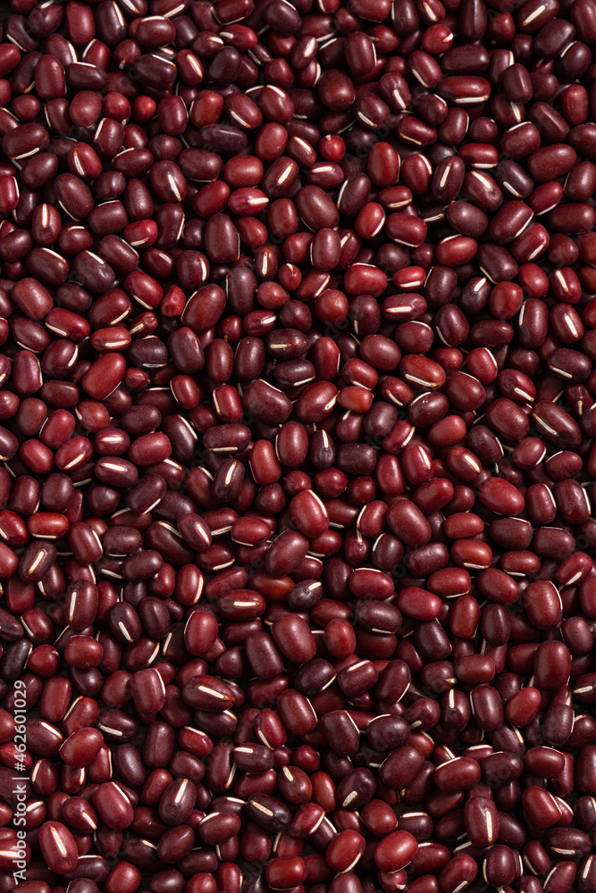 Raw adzuki red bean as background with spoon. Raw adzuki red bean as background with spoon.