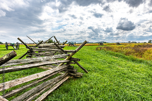 Beautiful sky with colorful fields, and rustic wooden fence during the fall on Antietam battlefield