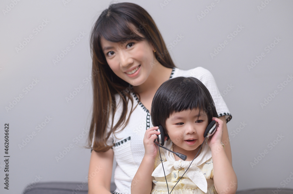 Portrait of happy asian mom and daughter Portrait of happy asian mom and daughter