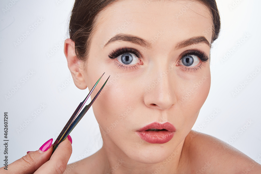 Brown hair Beautiful young woman beauty lashes. Extreme Long False Eyelashes. Lashing. Lash extensions. Brown hair Beautiful young woman beauty lashes. Extreme Long False Eyelashes. Lashing. Lash extensions.