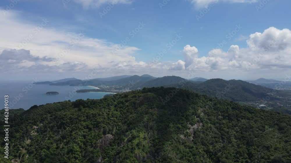 Aerial view of sand beach and blue ocean with sky and clouds Aerial view of sand beach and blue ocean with sky and clouds