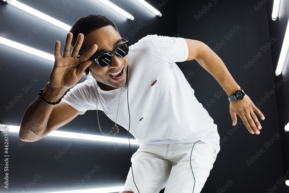 black man dancing in neon lights black man dancing in neon lights
