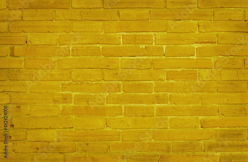 Yellow brick wall texture with vintage style pattern for background and design art work.