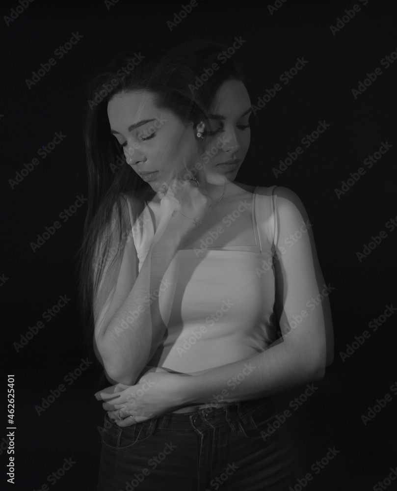 Naklejka premium Close-up photo of a melancholic woman with multiple personality disor