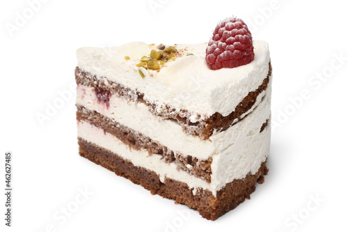 Slice of cream cake with fresh raspberry