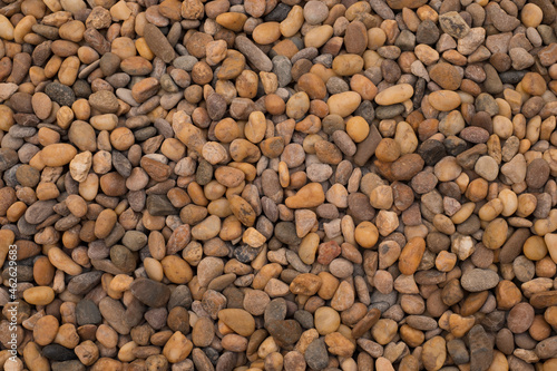 Photo of Pea Gravel or stone use for background wallpaper pattern.