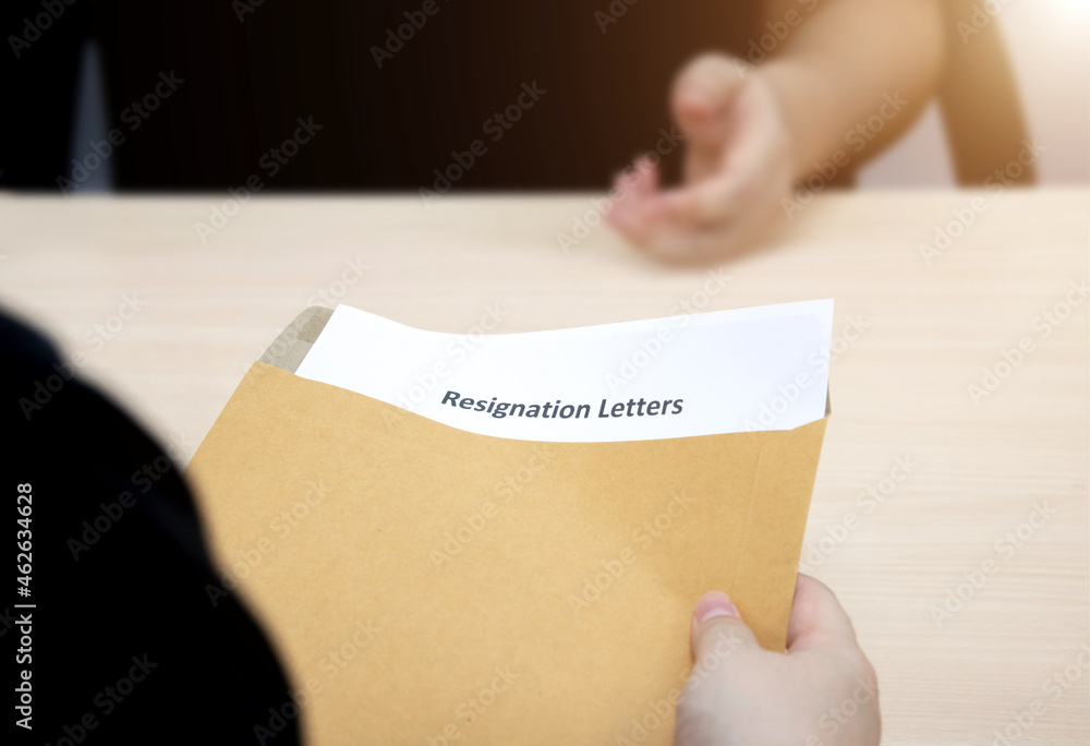 Resignation letter. Resignation letter in brown envelope. concept of